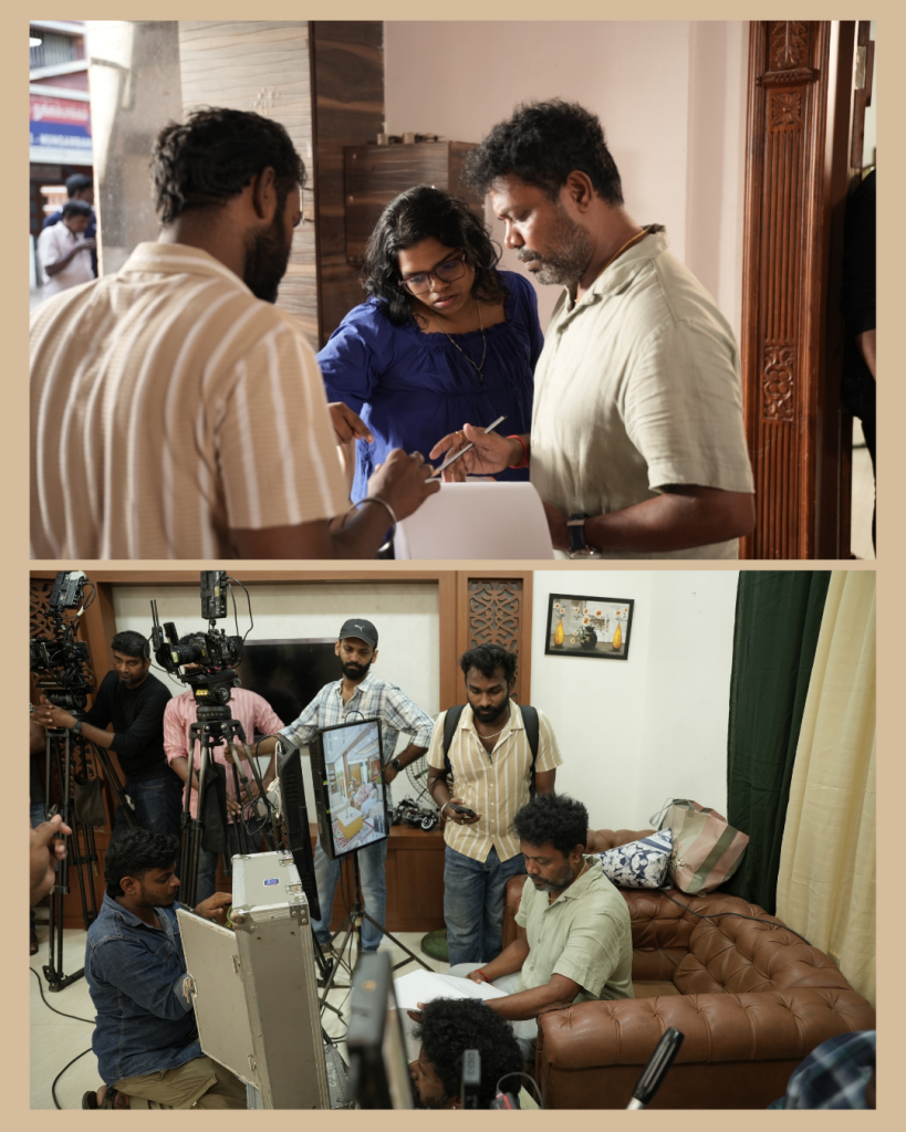Behind-the-scenes of a video shoot: two men and a woman review documents at a doorway.